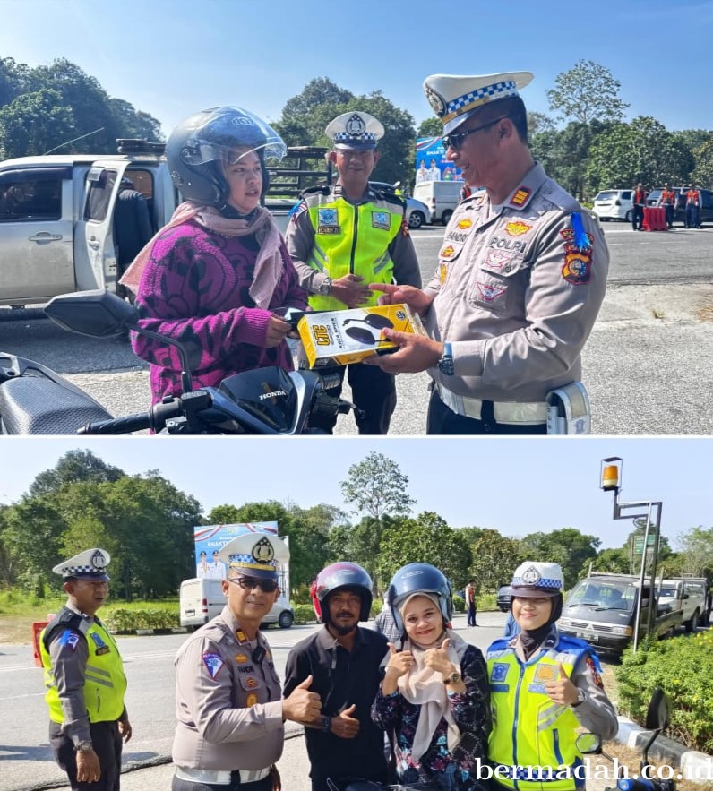 Kasat Lantas Polres Siak AKP Fandri Bagikan Helm SNI dan Kaca Spion